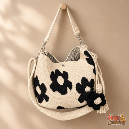 Bolso artesanal de crochet con flores negras